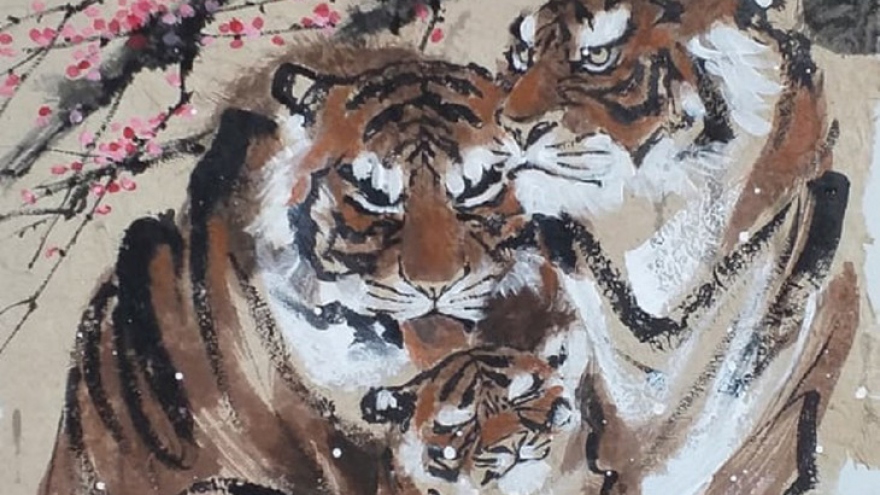 Lively paintings by Nguyen Doan Ninh to usher in Year of the Tiger